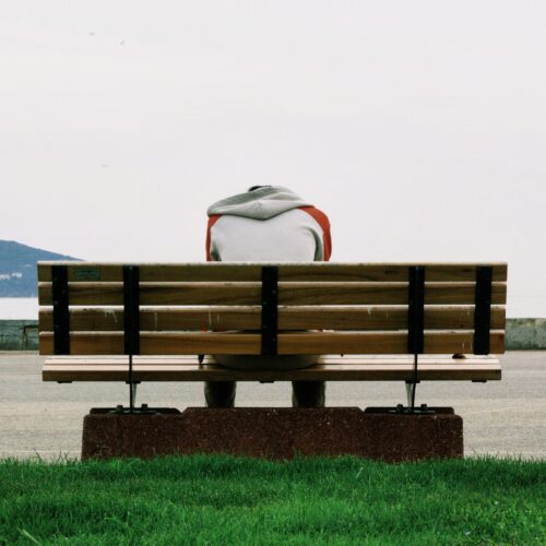 Lonely man on a park bench